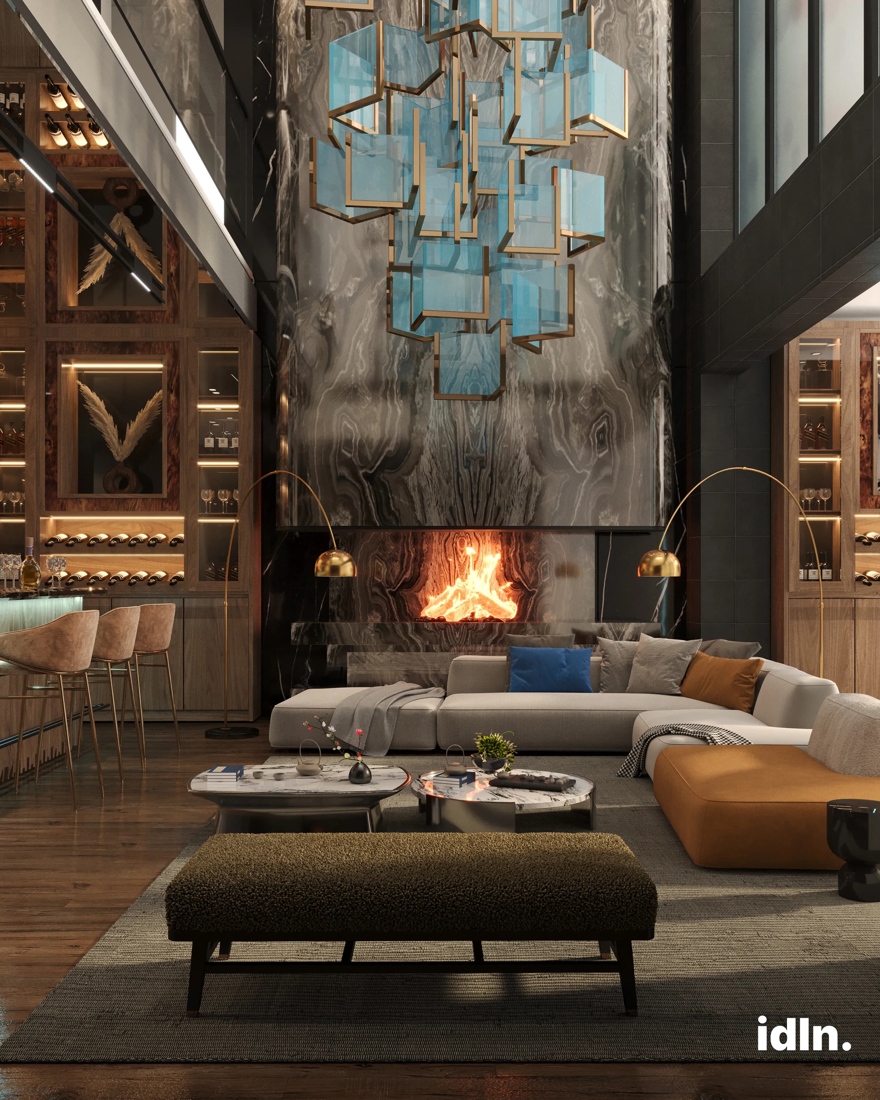 This is a picture of an open concpet living and bar area, fireplace, earthy tones